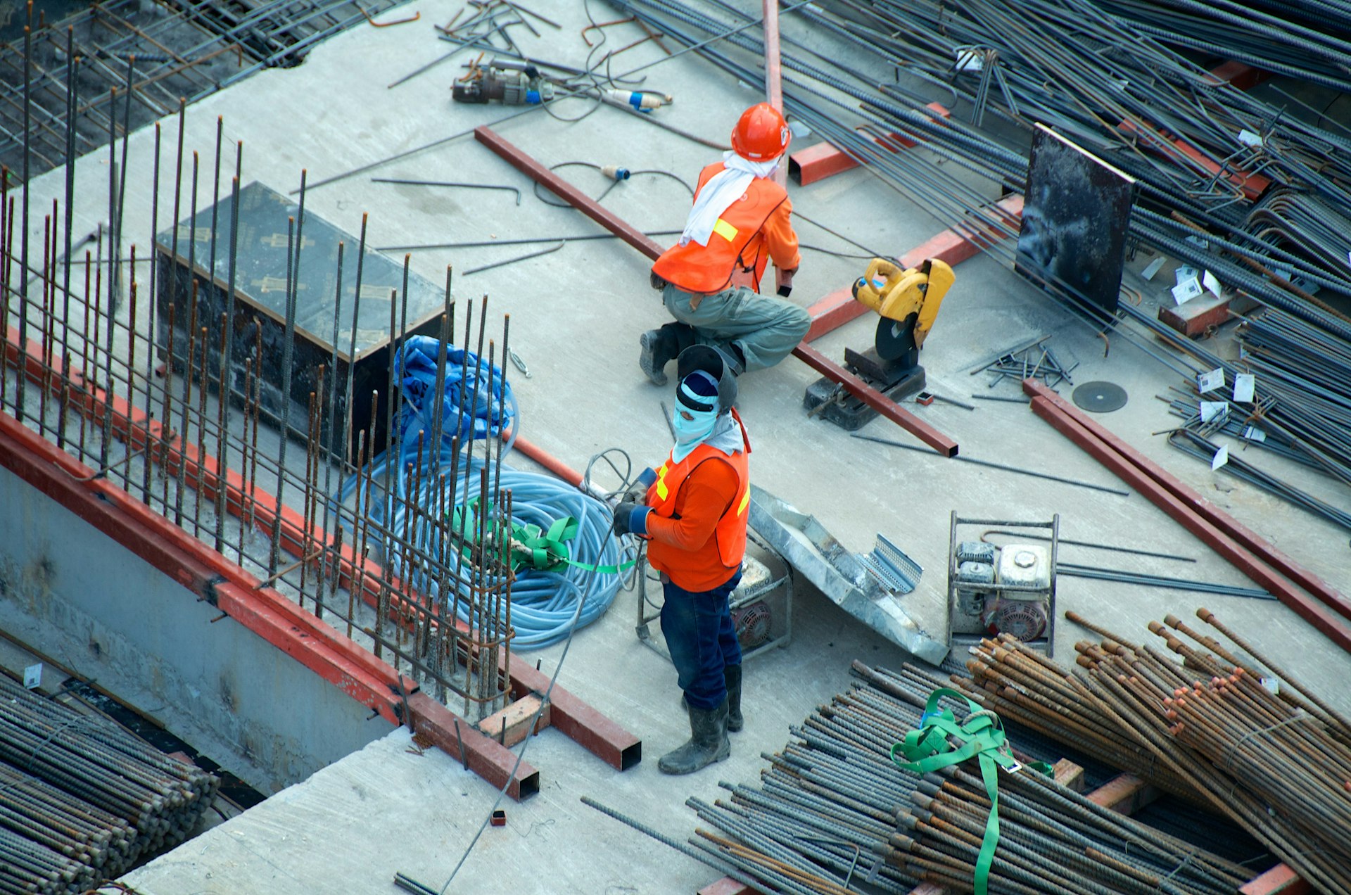 Construction workers with PPE on a job site Construction workers with PPE on a job site